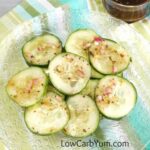 apple cider vinegar cucumber salad on clear glass plate