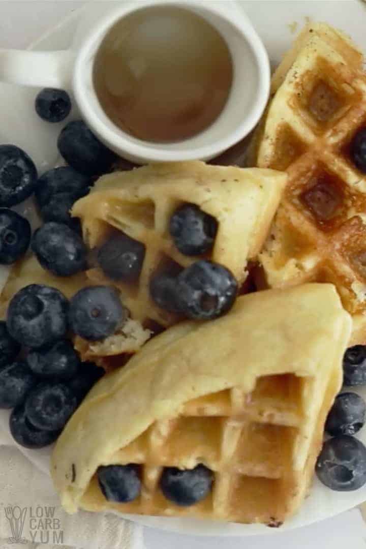 overhead view of low carb waffles with blueberries and syrup
