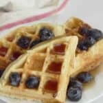 Keto low carb almond flour waffles with blueberries and syrup