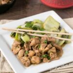 Low Carb Filipino Chicken Adobo with cooked celery and chopsticks