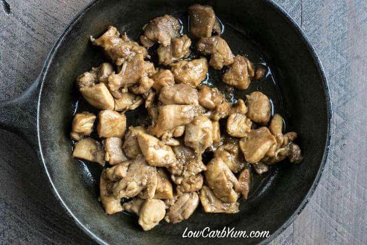 Cooking Filipino chicken adobo in pan