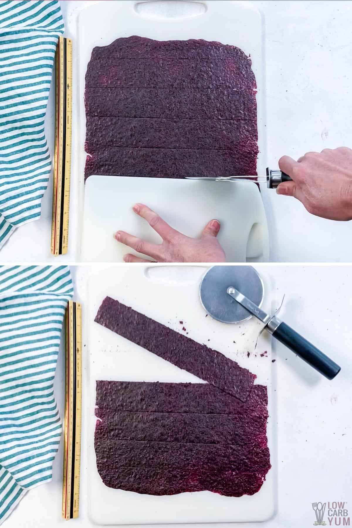 cutting a dried blueberry snack into strips.