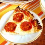 Low carb cauliflower pizza crust slice