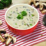 low carb gluten free cream of mushroom soup with mushrooms and spoon