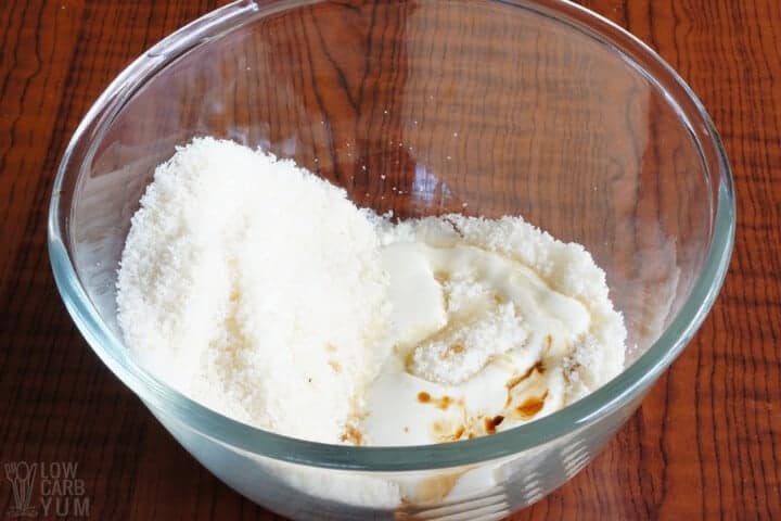 Coconut with cream and extracts in bowl