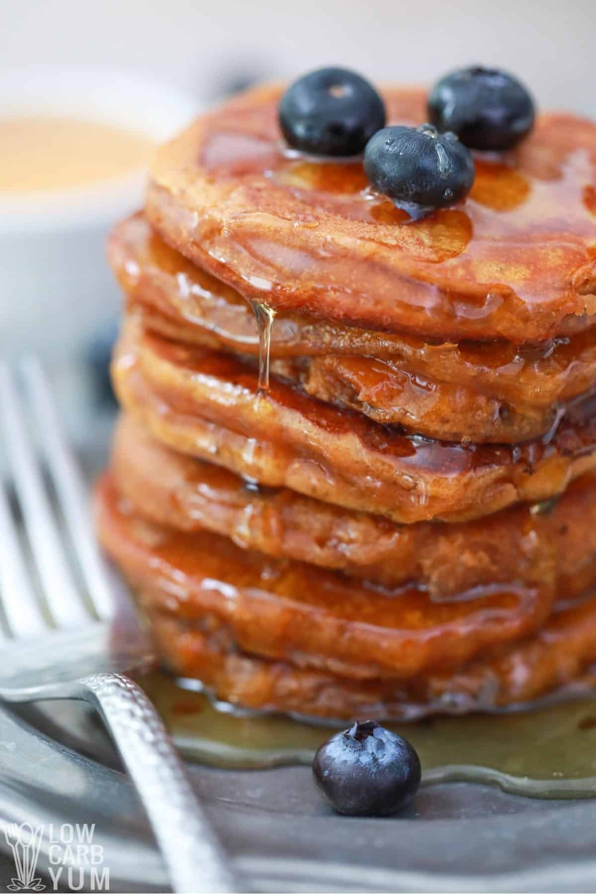 stack of peanut butter pancakes with blueberries