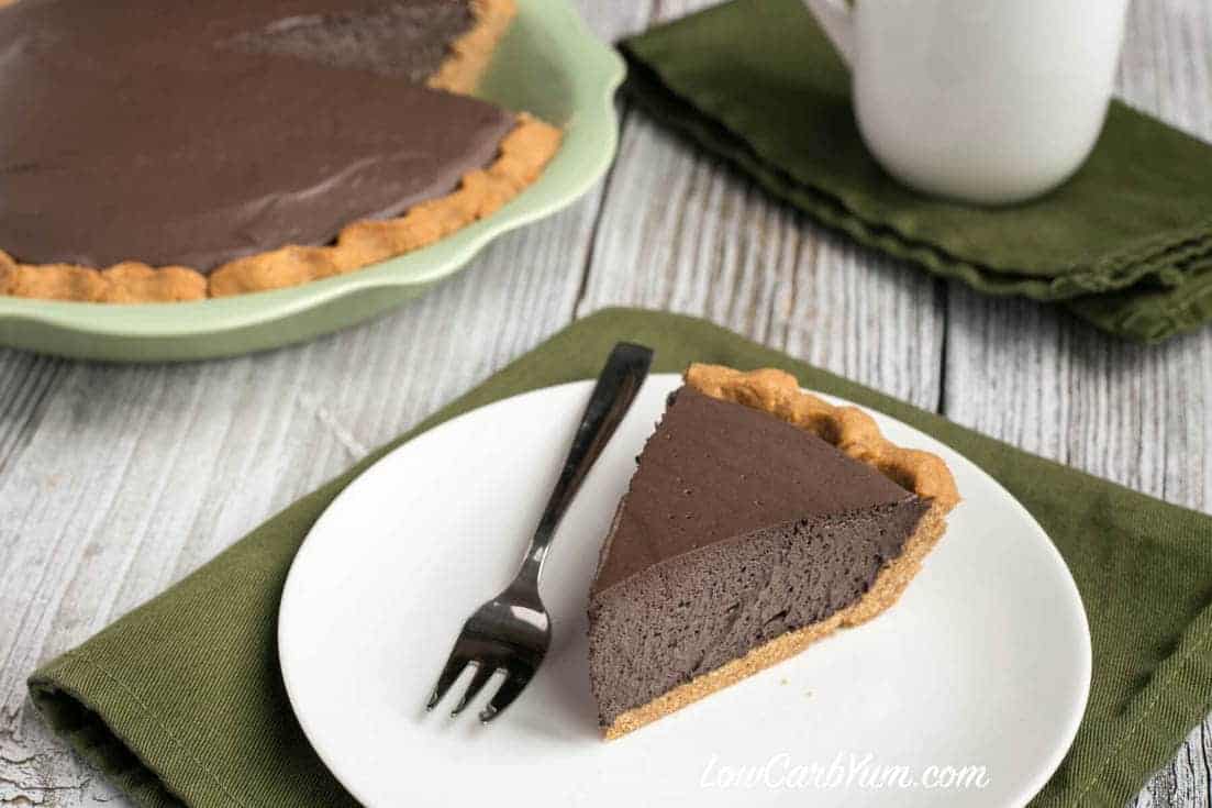 Low carb dark chocolate mousse pie with peanut flour crust