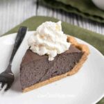 Low carb dark chocolate mousse pie with peanut flour crust