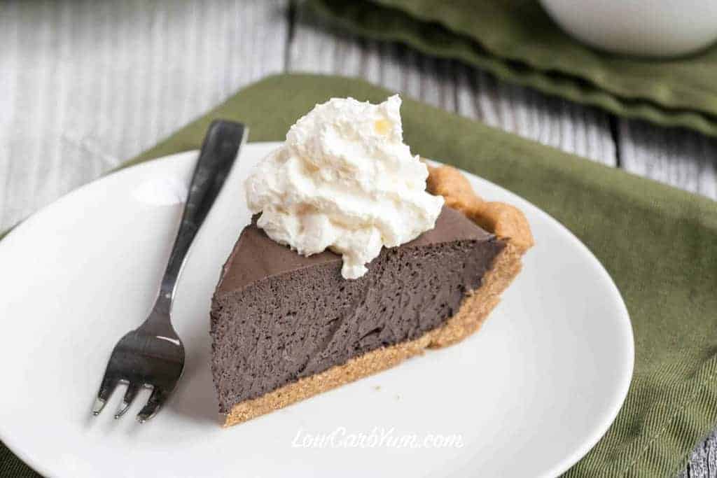 Low carb dark chocolate mousse pie with peanut flour crust