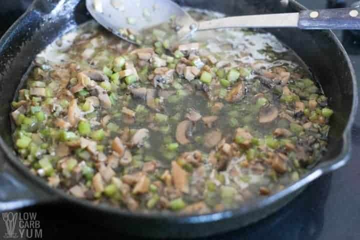Cooking celery and mushrooms in skillet
