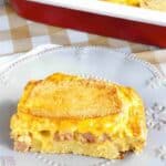 Slice of ham and cheese strata