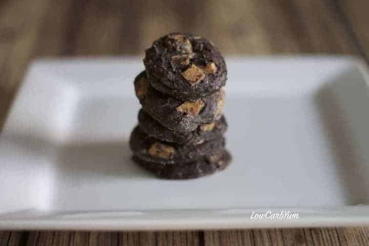 stack of chocolate cookies with peanut butter chips on plate