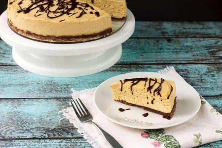 cheesecake on cake stand and slice on plate