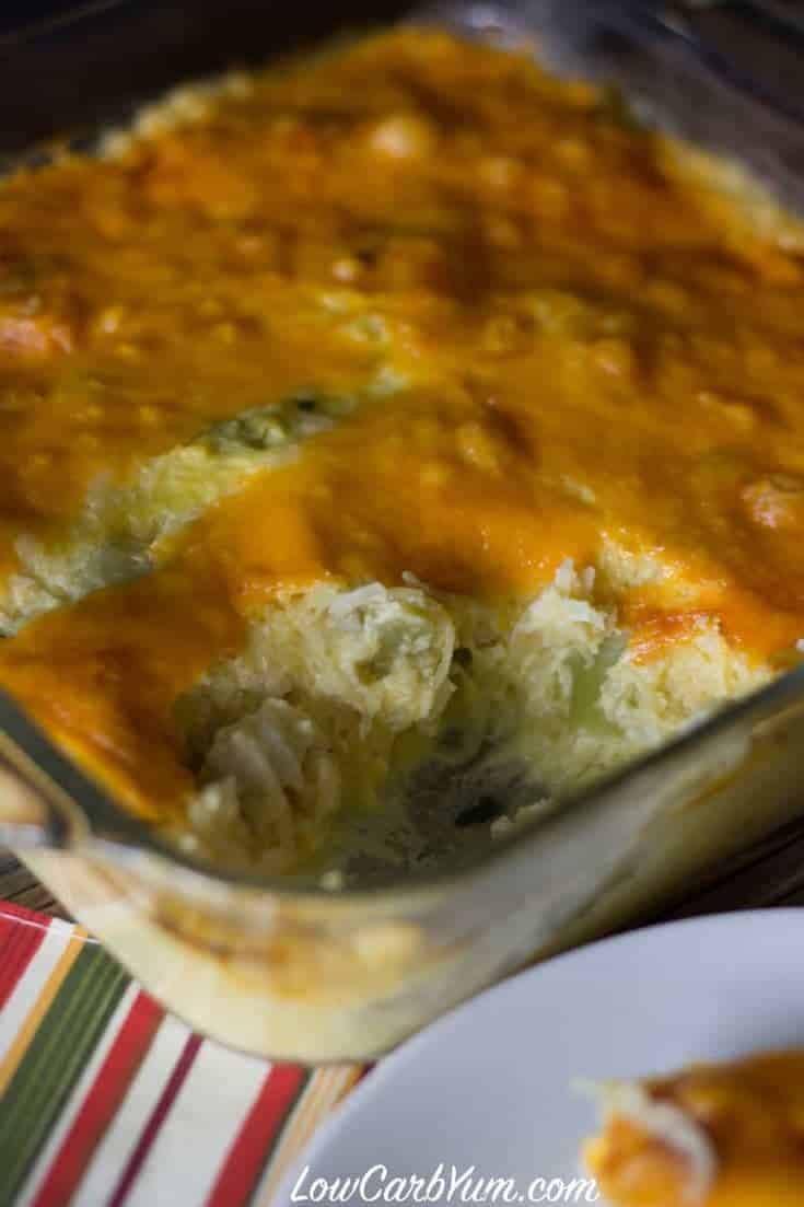 baking dish of spaghetti squash casserole with a serving scooped out
