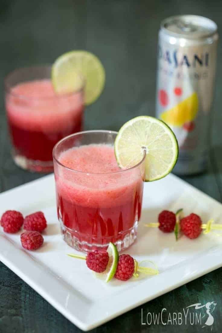 Make any day special with this low carb sparkling raspberry limeade mocktail. It's a low calorie sweet fruity drink to help you make every moment sparkle. | LowCarbYum.com