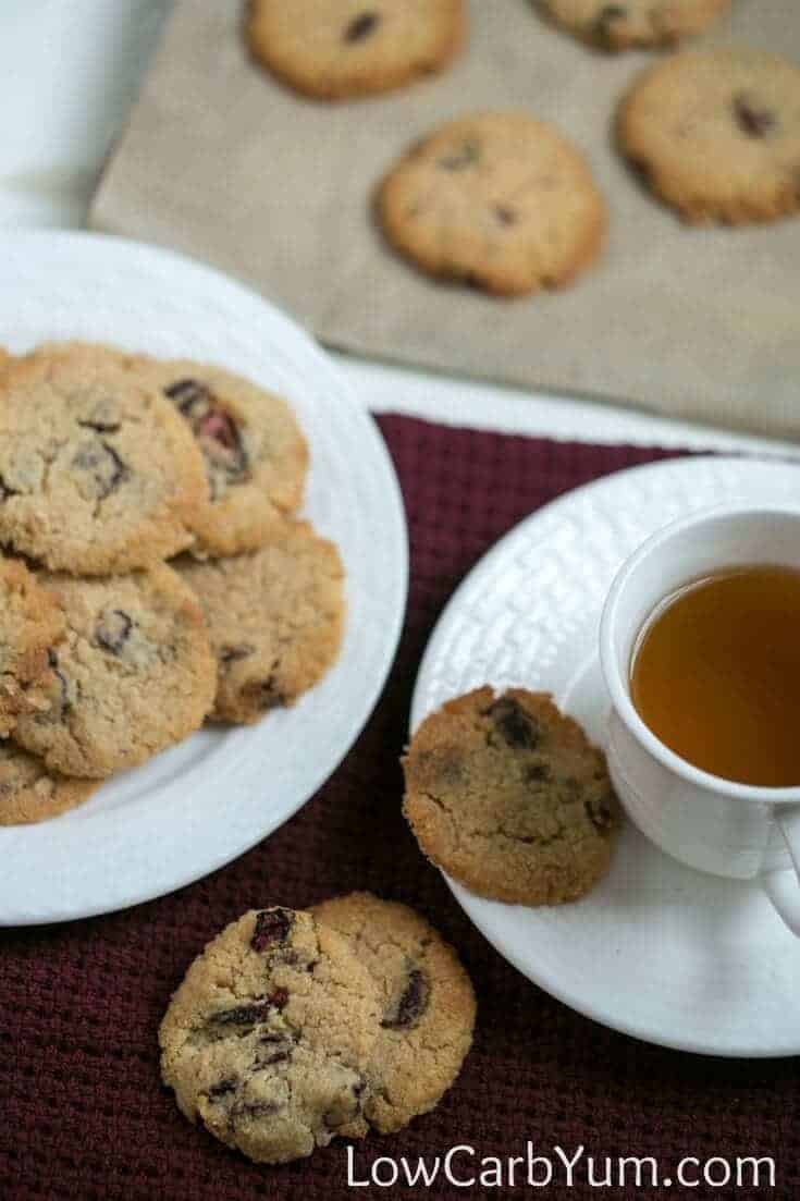 gluten free almond flour cranberry walnut cookies on plate with tea