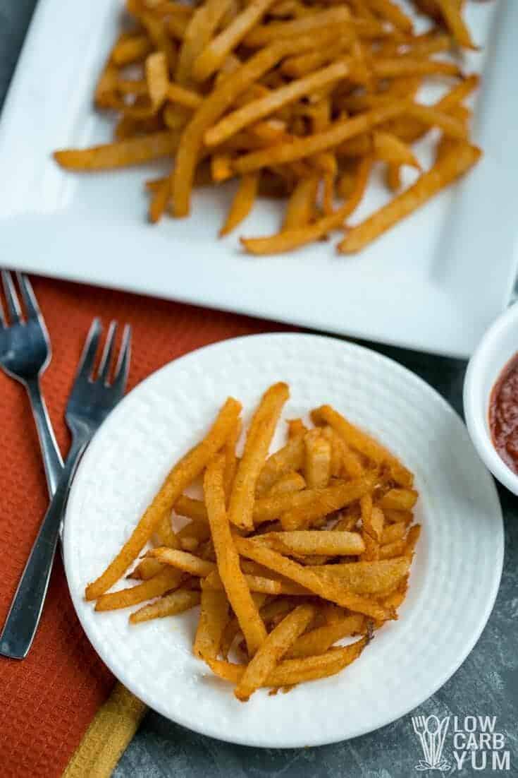 low carb seasoned jicama fries on a white plate