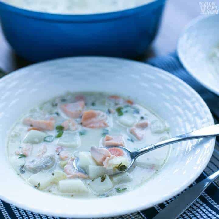 salmon chowder in bowl with spoon