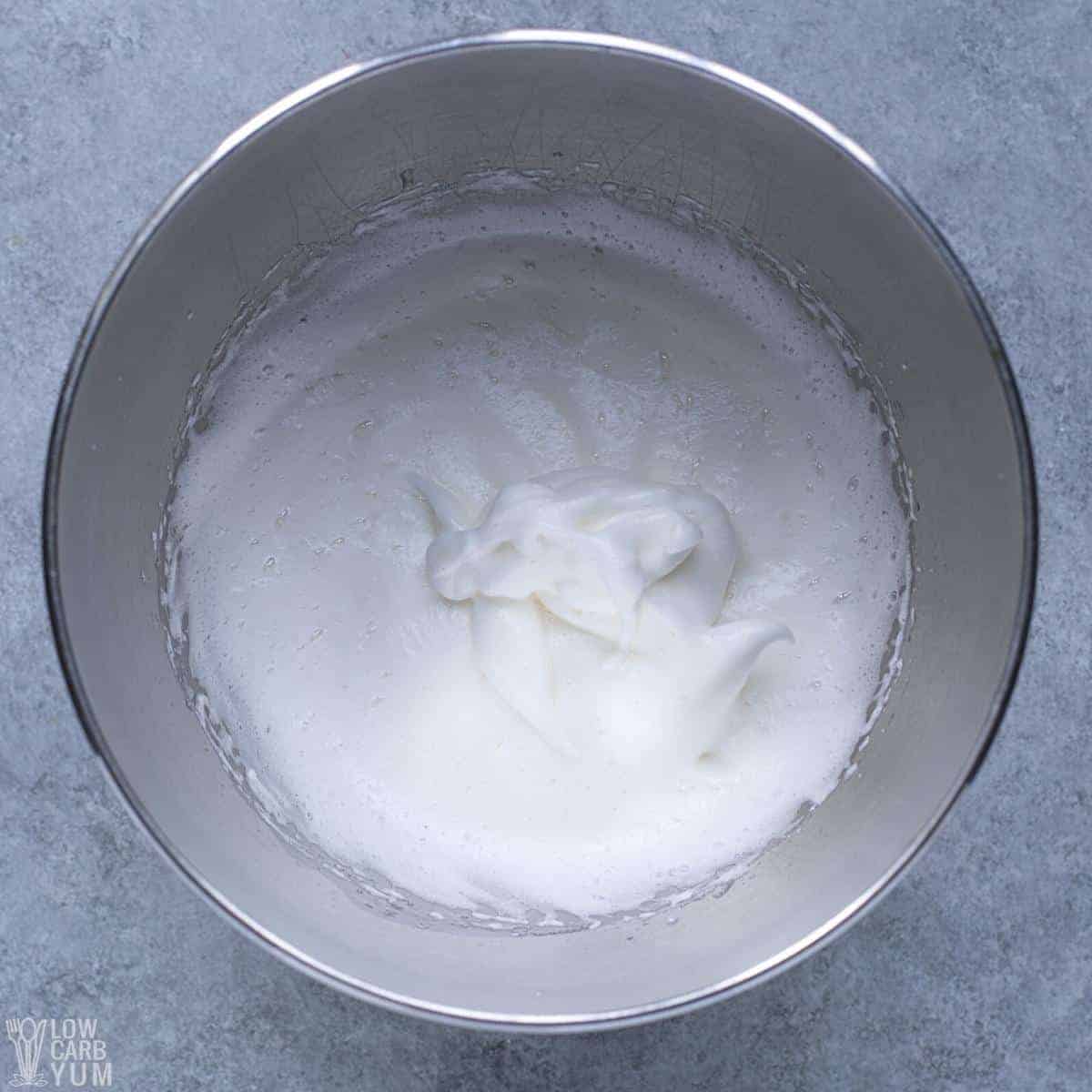 beaten egg white meringue in mixing bowl.