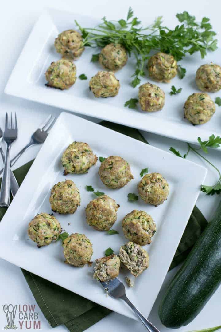 Easy to make chicken or turkey zucchini meatballs baked in the oven. The shredded zucchini ensures that the meat stays moist. Makes a tasty appetizer! #glutenfree #dairyfree #keto #lowcarb | LowCarbYum.com
