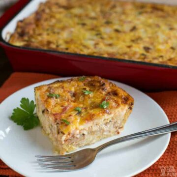 low carb breakfast casserole on plate with fork and casserole in pan