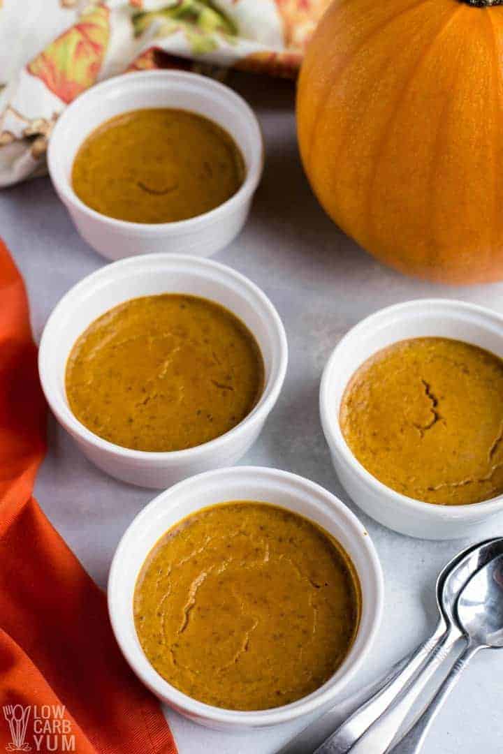 serving pumpkin custard with spoons