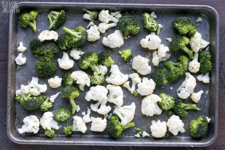 Broccoli and cauliflower in pan before roasting