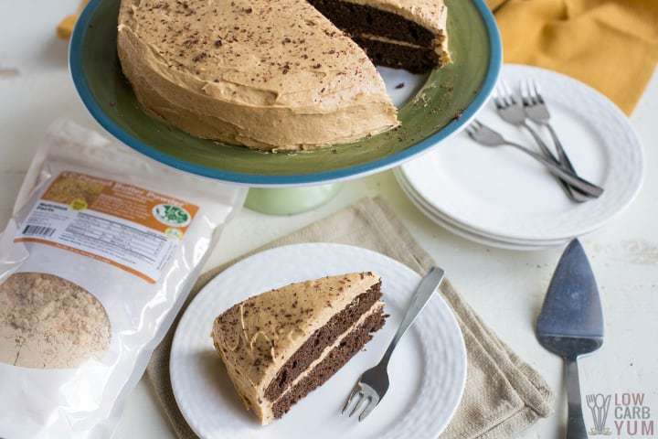 Slice of cake on plate with peanut butter powder