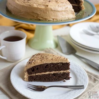 Chocolate Peanut Butter Cake on plate and on cake platter