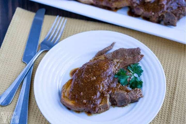 pressure cooker pork chop on plate with BBQ sauce