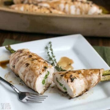 Asparagus Stuffed Chicken Breasts on plate and in platter