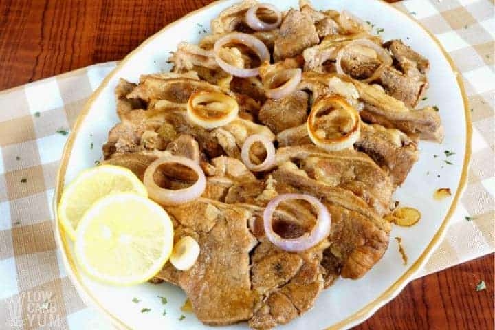 pork bisteks on platter