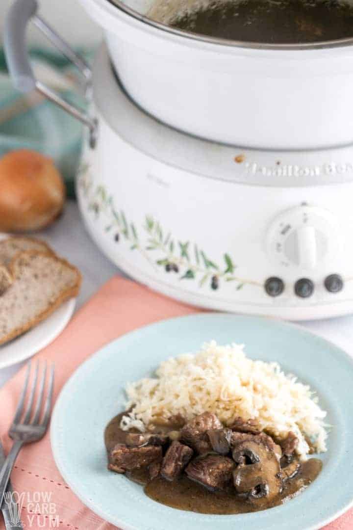 plate of steak tips with crock pot