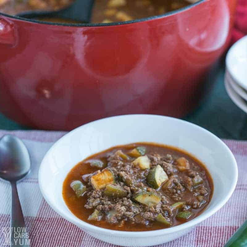venison chili in bowl and more in pot