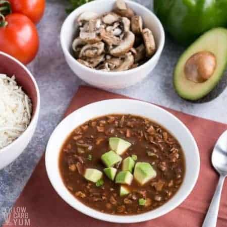 close up of vegan crockpot chili and ingredients