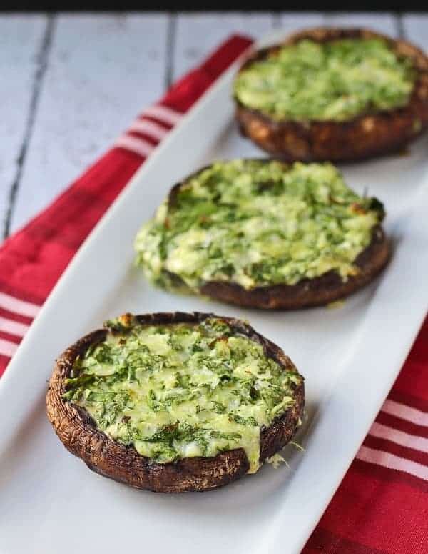 large portobello mushroom caps stuffed with spinach and cheese