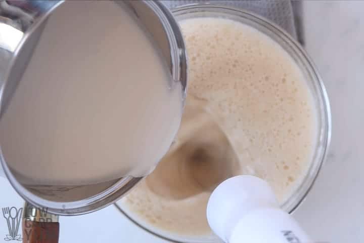 adding hot coconut milk