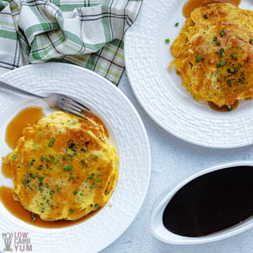 chicken egg foo young on white plates overhead shot