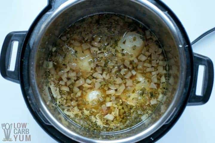 cooked chicken soup in pot