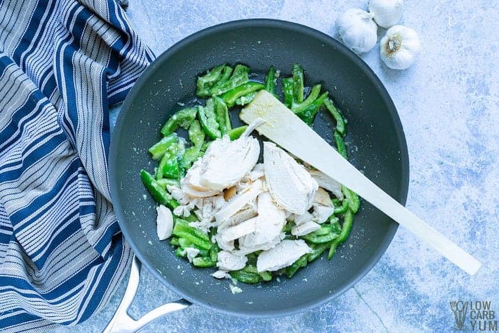 adding chicken to skillet