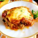 keto lasagna slice on white plate