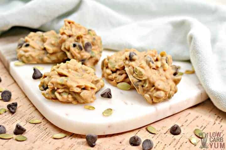 horizontal image of keto no bake cookies on white cutting board