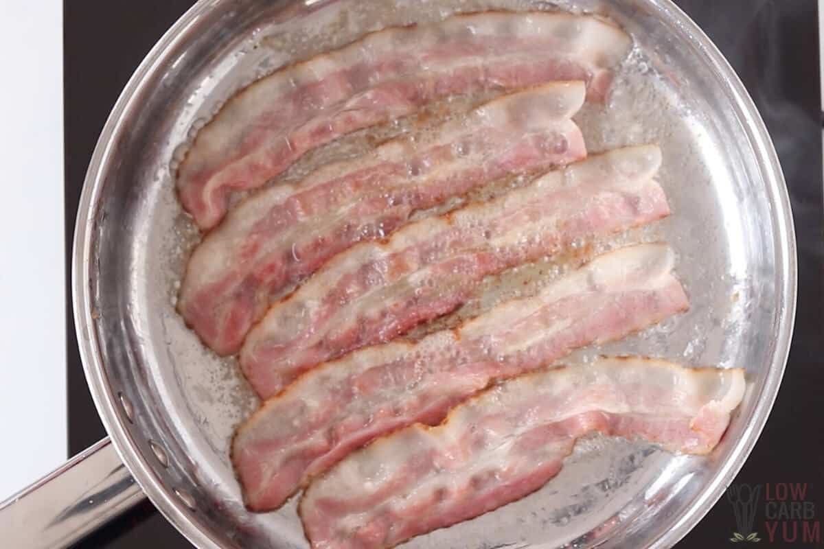 frying bacon in pan