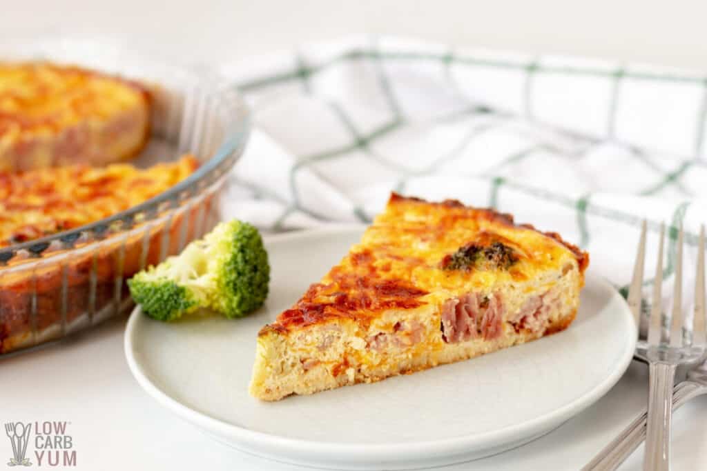 slice of broccoli and ham quiche on small plate