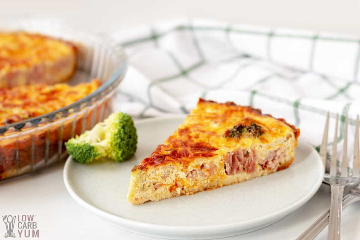 slice of broccoli and ham quiche on small plate