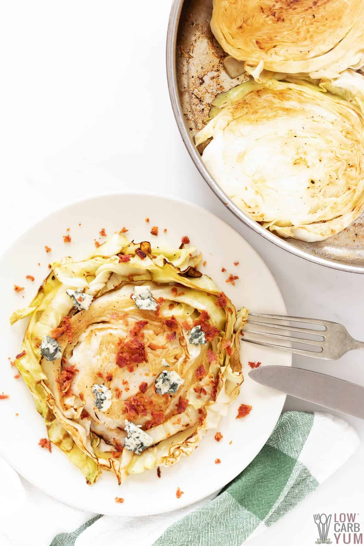 serving keto cabbage steaks with bacon