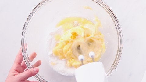 combine butter and sweetener with mixer