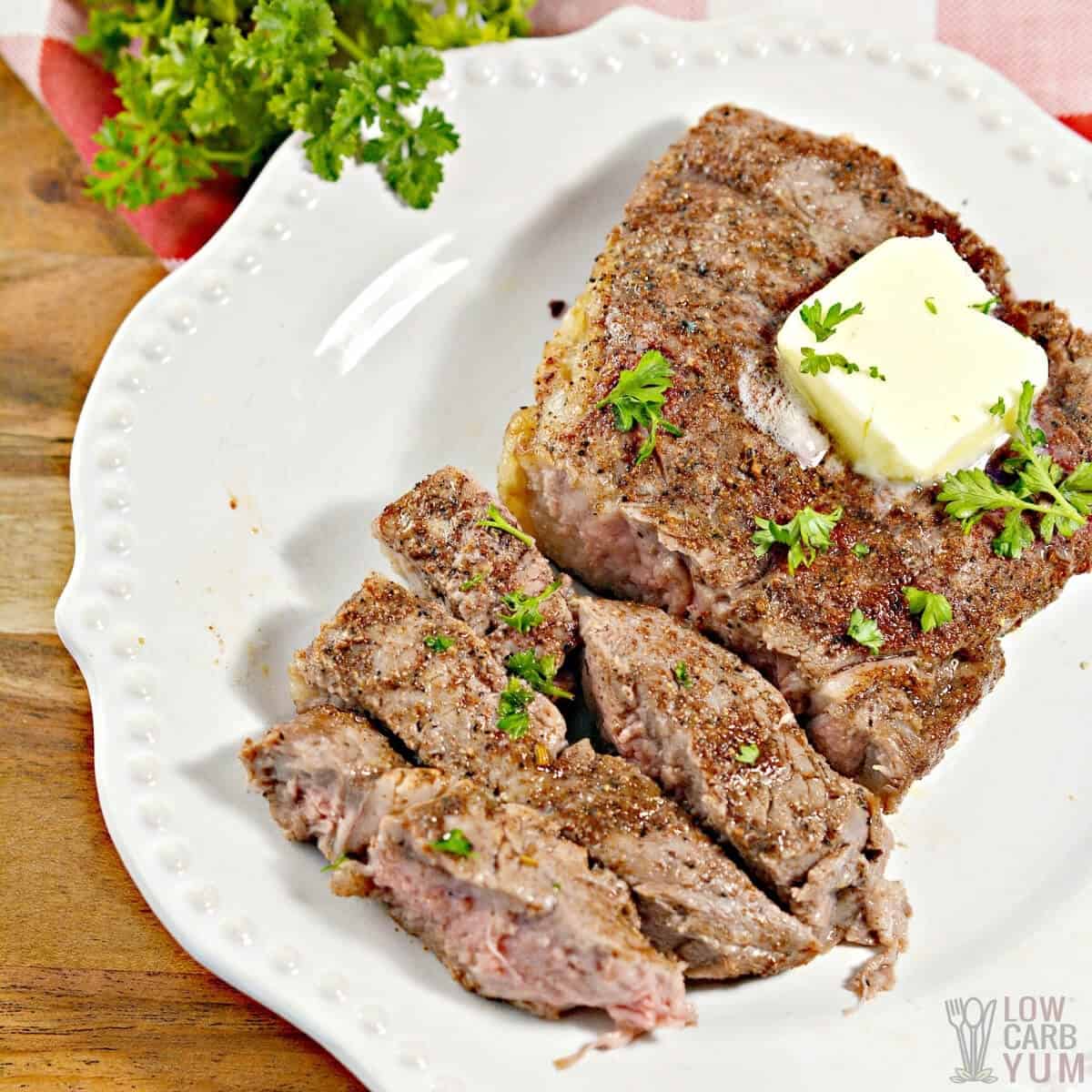 air fryer steak on plate with butter