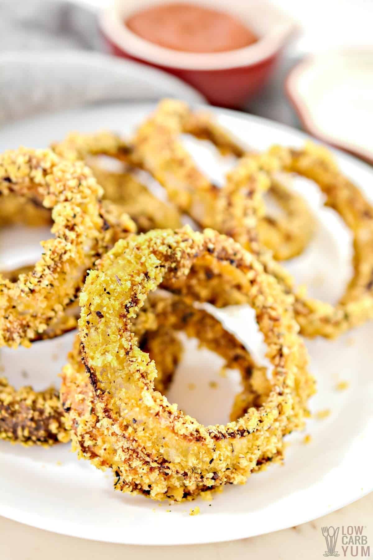 baked keto onion rings served with low carb ketchup