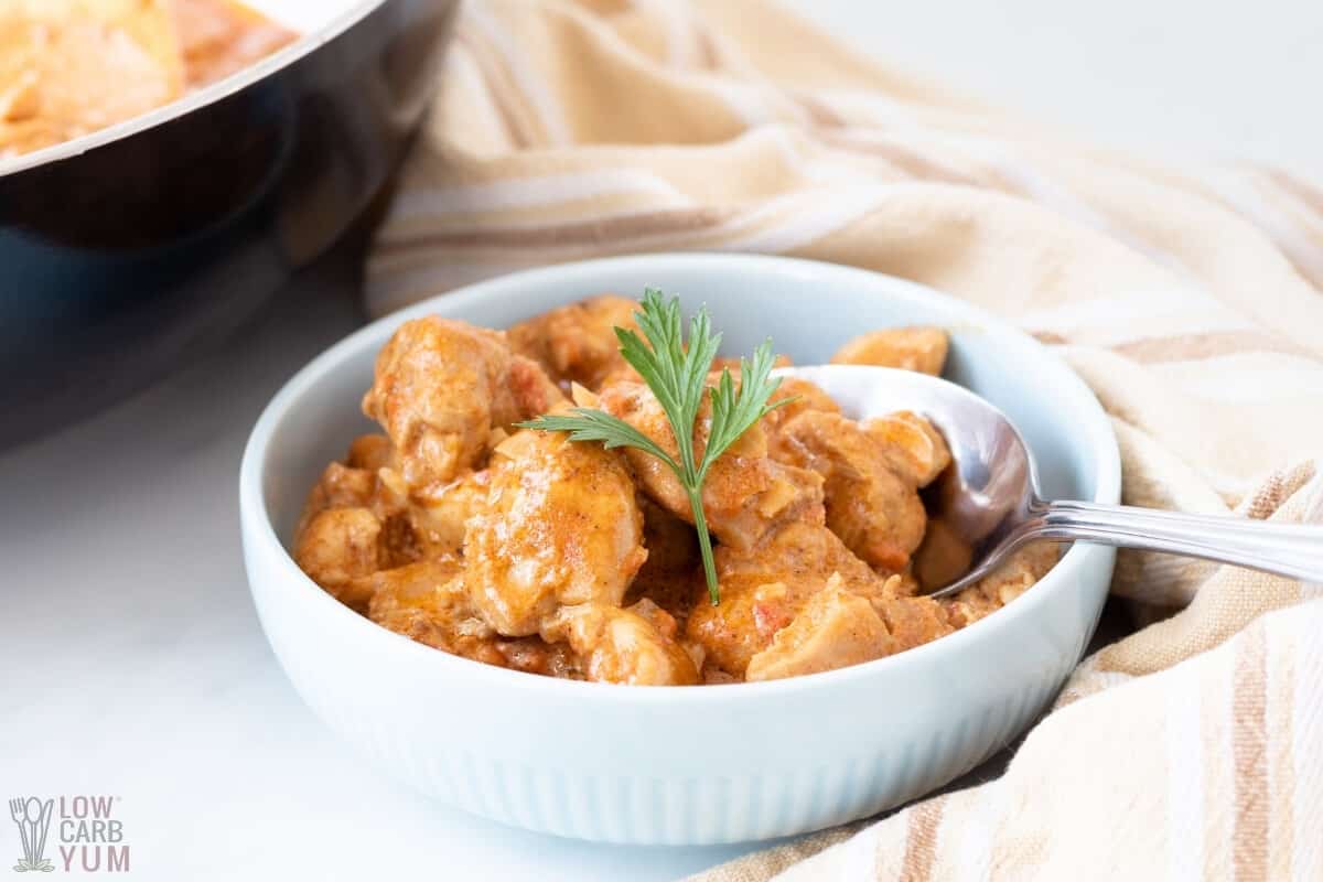 butter chicken in white bowl